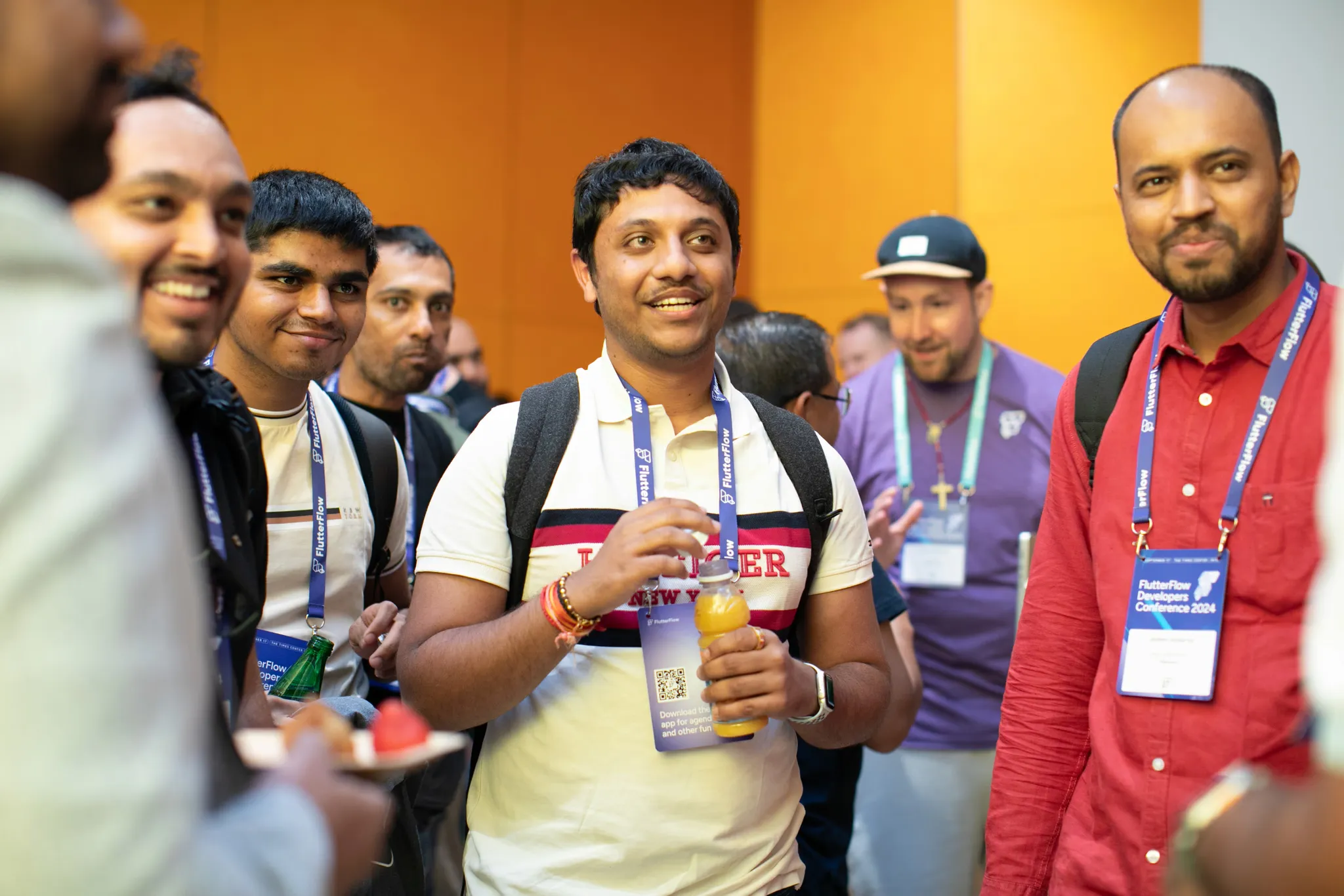 Attendees networking in the FFDC lounge